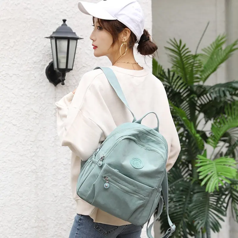 Mochila de gran capacidad para mujer, bolso de viaje ligero y sencillo que combina con todo, bolso escolar de nailon Oxford