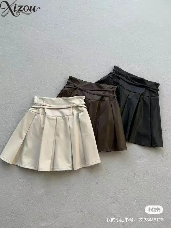 

Женская мини-юбка с высокой талией, эластичным поясом, А-силуэт, винтажная, в корейском уличном стиле, кожаная плиссированная юбка для девочек, 2026, цвет хаки, однотонная