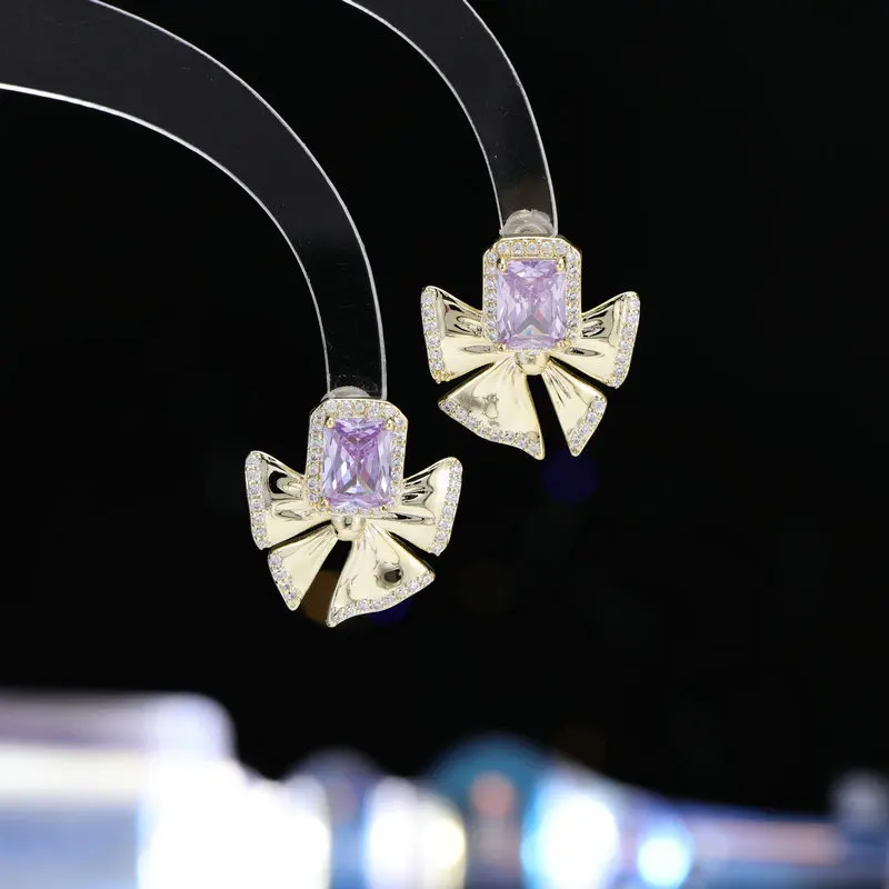

Sweet American diamond geometric bow zircon stud earrings are simple, versatile and fashionable earrings for women