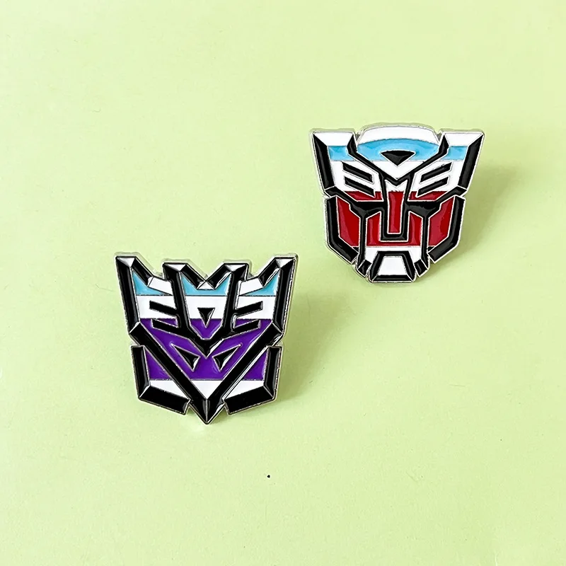 Hasbro Transformers Lapel Pins การ์ตูนตัวอักษรเคลือบ Pin น่ารักเข็มกลัดโลหะ Lapel ป้ายการ์ตูนตลกเครื่องประดับของขวัญ