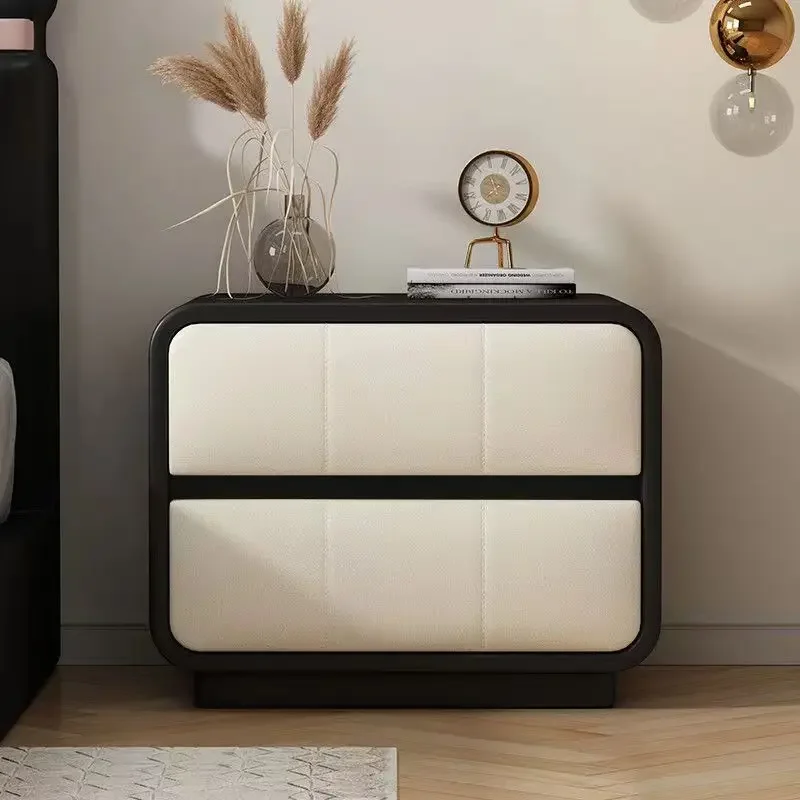 

A Modern simple solid wood bedside table Soft bag bedside table Cream style Bedroom storage cabinet Household floor