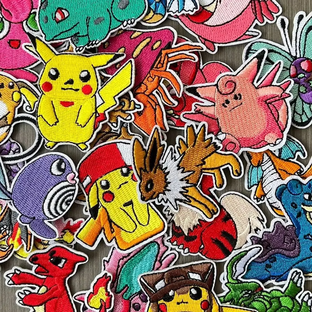 25 Pcs Cartoon Pokemon Pikachu Game Monster Character DIY for Sew Clothing Iron on Adhesive Embroidery Patches Coat Appliques