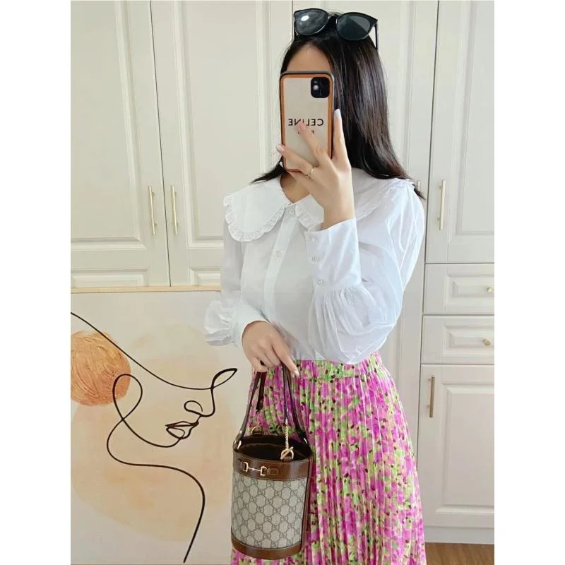 

Романтичная миди-юбка с эффектом похудения, с эластичной талией, плиссированным дизайном и розовым цветочным принтом, средней длины