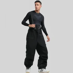 Pantalones con correa de esquí para hombre y mujer, monos de esquí cálidos y gruesos para exteriores, pantalones de Snowboard holgados impermeables y a prueba de viento para invierno