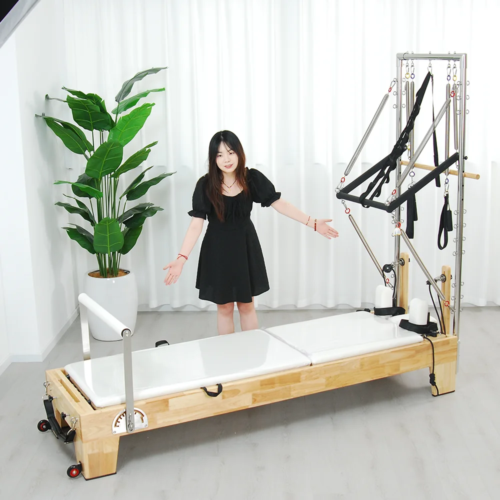 

Коммерческая домашняя мини-кровать-реформер для пилатеса с полутрапеционной башней, профессиональное оборудование для продажи студии йоги