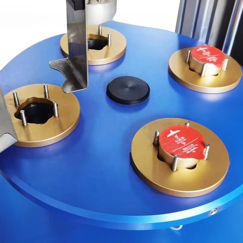Vertical 4-Stations Semi-Automatic Continuous Rotary Pneumatic Mini Can Tea Cup Plastic Bottle K Cup Paper Cartons Sealing