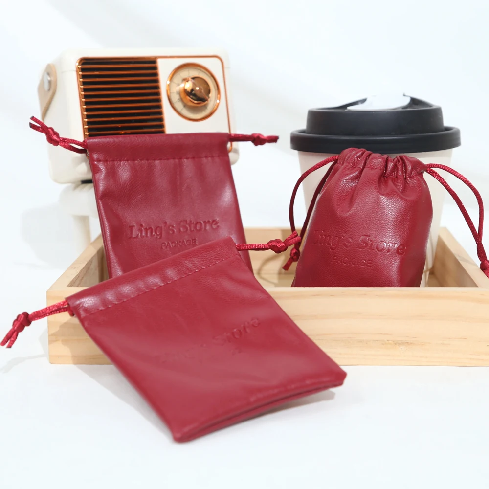 50/100 шт. шикарные индивидуальные ювелирные изделия из искусственной кожи, сумка на шнурке, подарочная упаковка, сумки для сережек, косметический органайзер для париков, карман для хранения