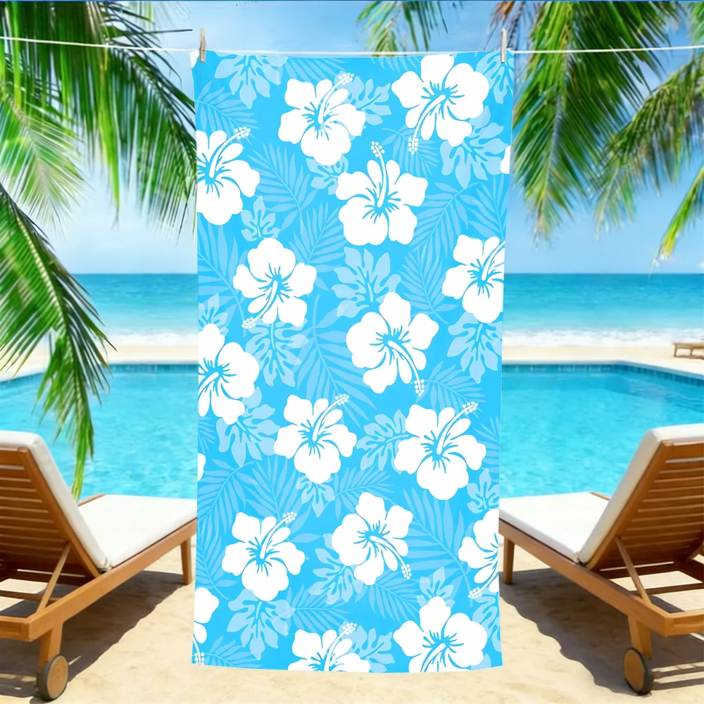 

Пляжное полотенце Tropical Hibiscus – мягкое, впитывающее полотенце из микрофибры с синим принтом пальмовых листьев и цветов для лета