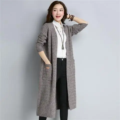 Autumn and winter new loose slimming mid length knitted jacket fashionable solid color long sleeved sweater cardigan outer outfi