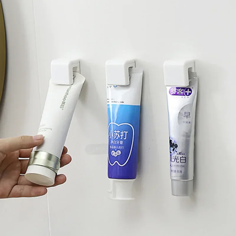 

Multi-Functional Wall-Mounted Bathroom Hooks with Toothpaste Holder and Facial Cleanser Rack