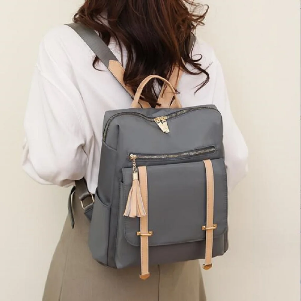 Hot Sale Fashion Tassel Waterproof Oxford Backpack Women Casual Large Capacity Shoulder Bags Laptop School Bag Travel Backpacks