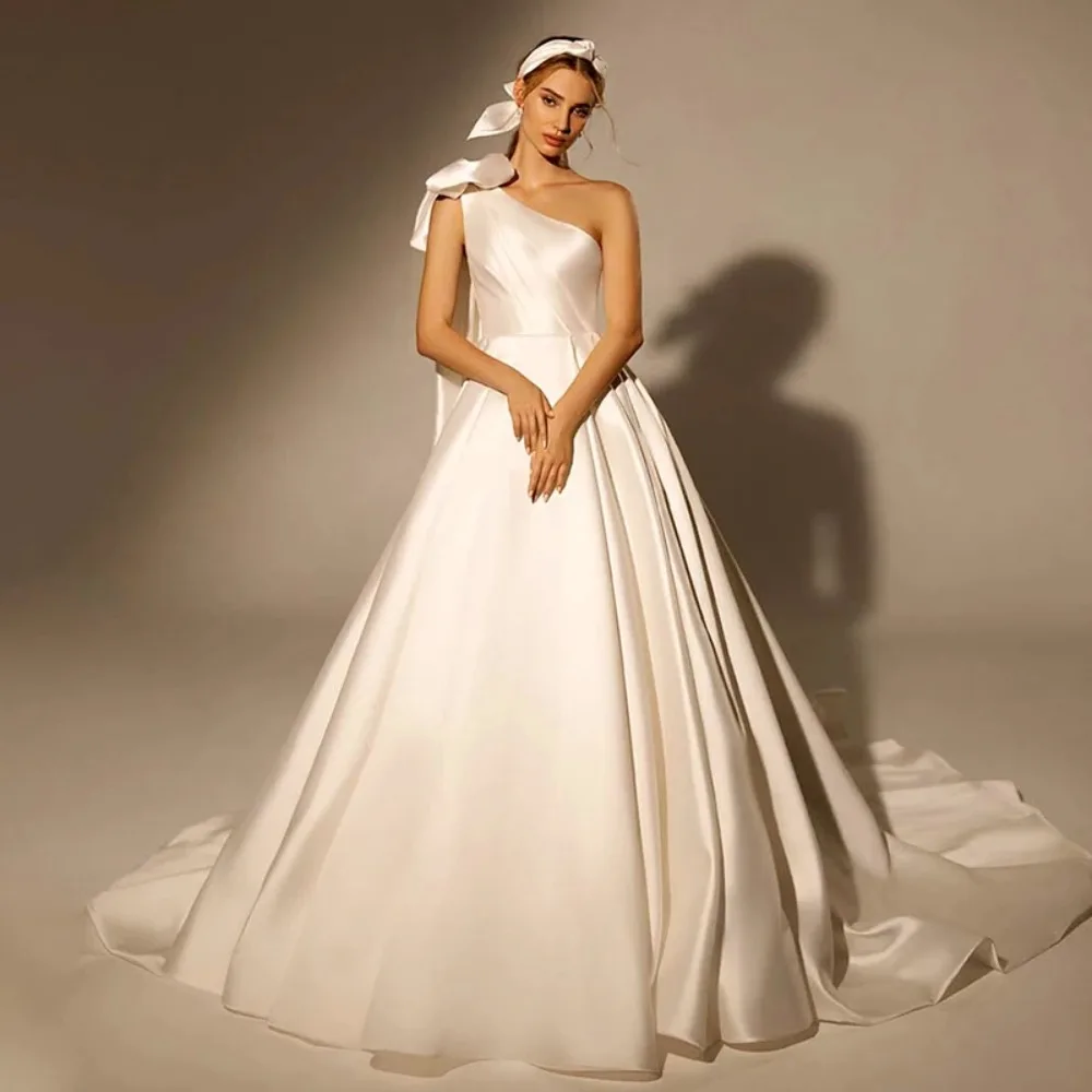 Customized One Shoulder Satin A-line Wedding Dress 2026 Elegant Bow Details Ruffles Bridal Gown Suitable for Formal Occasions