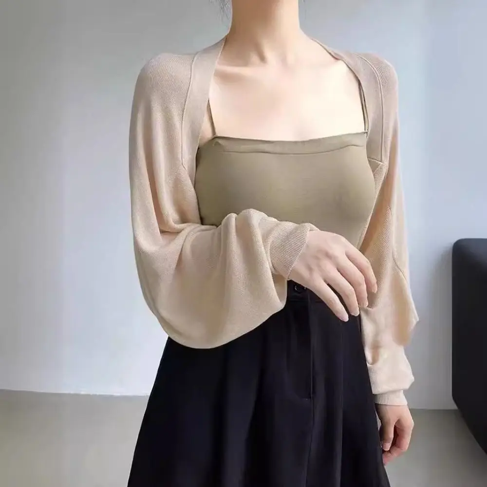 Semplice scialle estivo in maglia sottile a maniche lunghe tinta unita scialle in seta di ghiaccio avvolge abiti casual con protezione solare