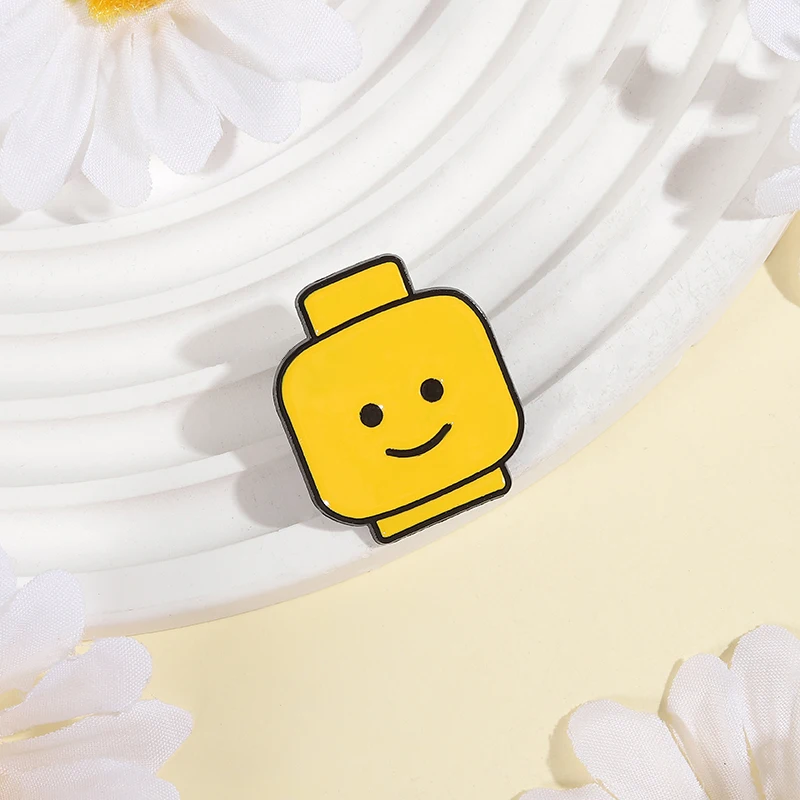 Movie Building Blocks Bricks Enamel Pins Custom Yellow Funny Face Brooches Lapel Badges Clothes Funny Jewelry Gift for Friends