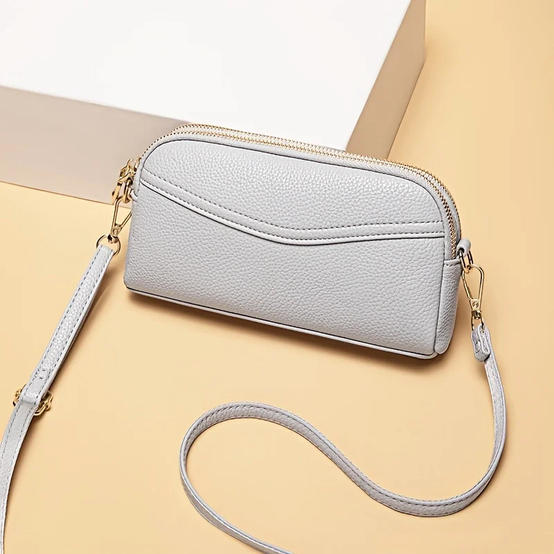 

Simple and stylish handbag, versatile for daily commuting, crossbody bag, car stitching, key bag, change, hand-held small bag