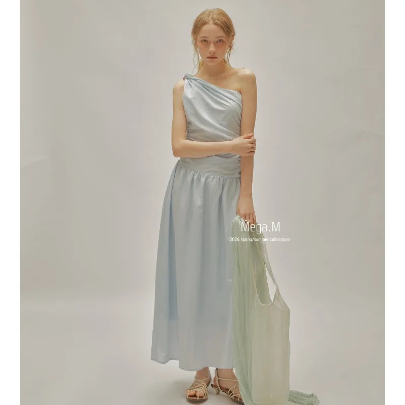 A slant neckline, off-shoulder, waist-cinching long dress, French dress, and a sophisticated look for women's summer