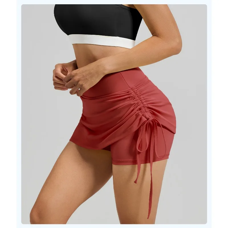 กระโปรงกีฬาแบบรัดรูปพร้อมกางเกงซับในสำหรับผู้หญิง ยืดหยุ่นสูง แฟชั่นลำลอง กระโปรงฟิตเนส ดีไซน์สองชิ้นในตัว กระโปรงโยคะ