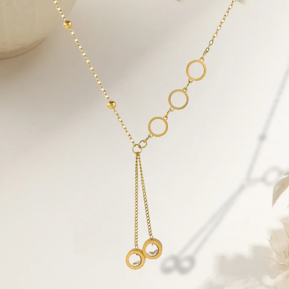 

Hollow round necklace Korean version fashion jewelry Roman round white zircon fringed pendant