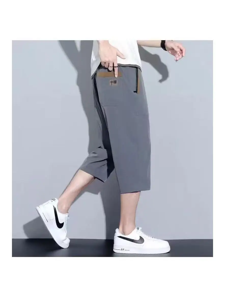 Pantaloni sportivi da uomo larghi in seta di ghiaccio Qui Dry con elastico in vita Gamba dritta Lunghezza sette piedi Sle giovanile e vitale