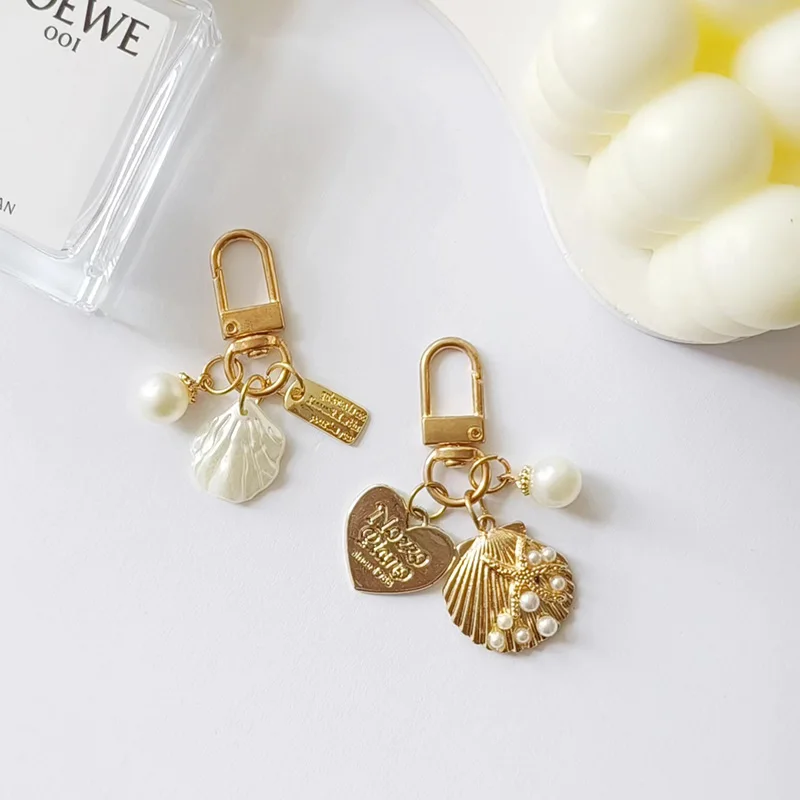 Creative Alloy Shell Pearl Key Chain for Women Cute Conch Pendant Keyring Handbag Ornament Car Key Accessories Small Gifts view 3