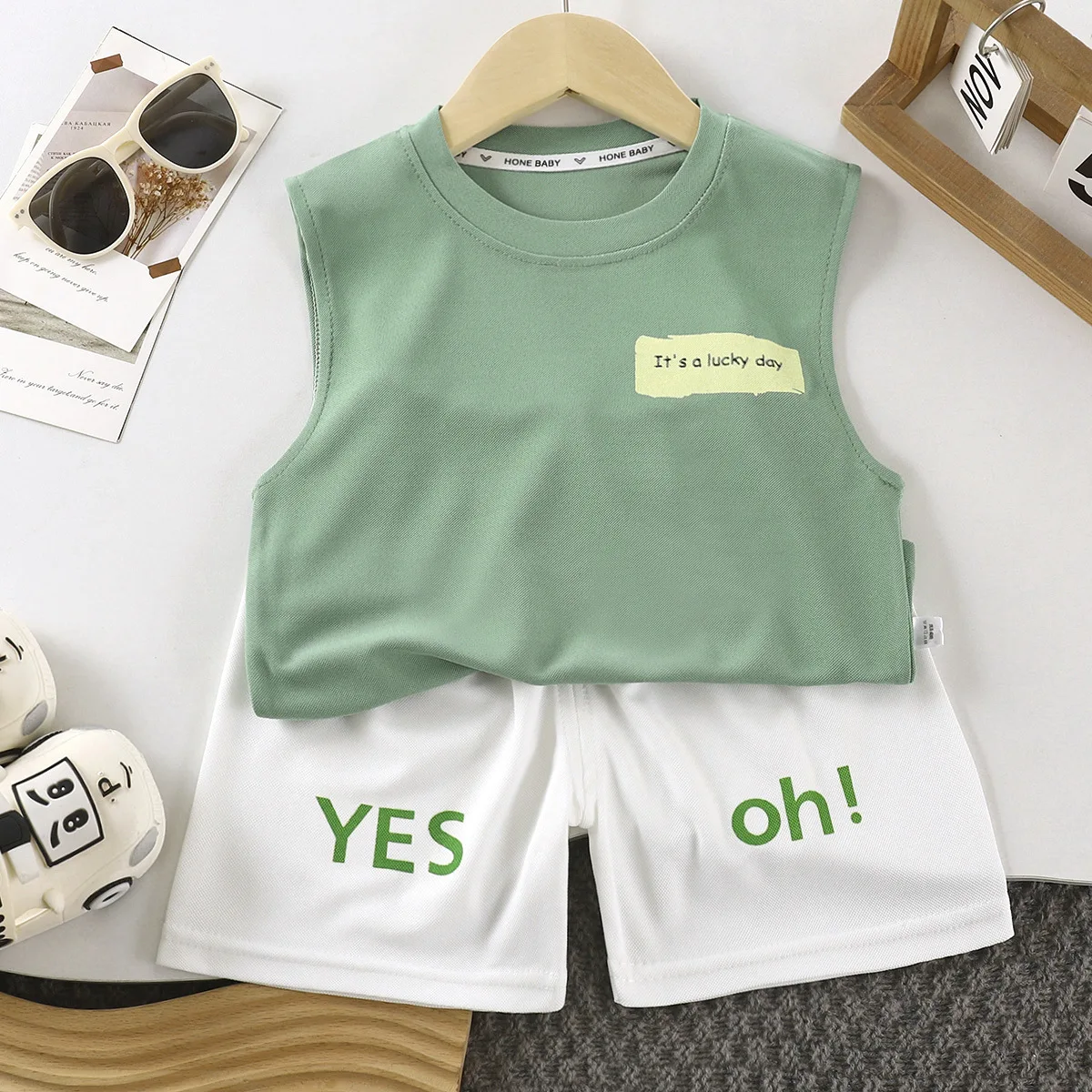 

Детский комплект хлопкового жилета с круглым вырезом, шорты без рукавов с буквенным принтом для мальчиков и девочек, корейская версия, спортивная одежда, комплект из двух предметов, новинка лета