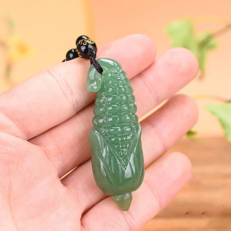 

Dongling jade round round full of years Ping An carved corn jade pendant