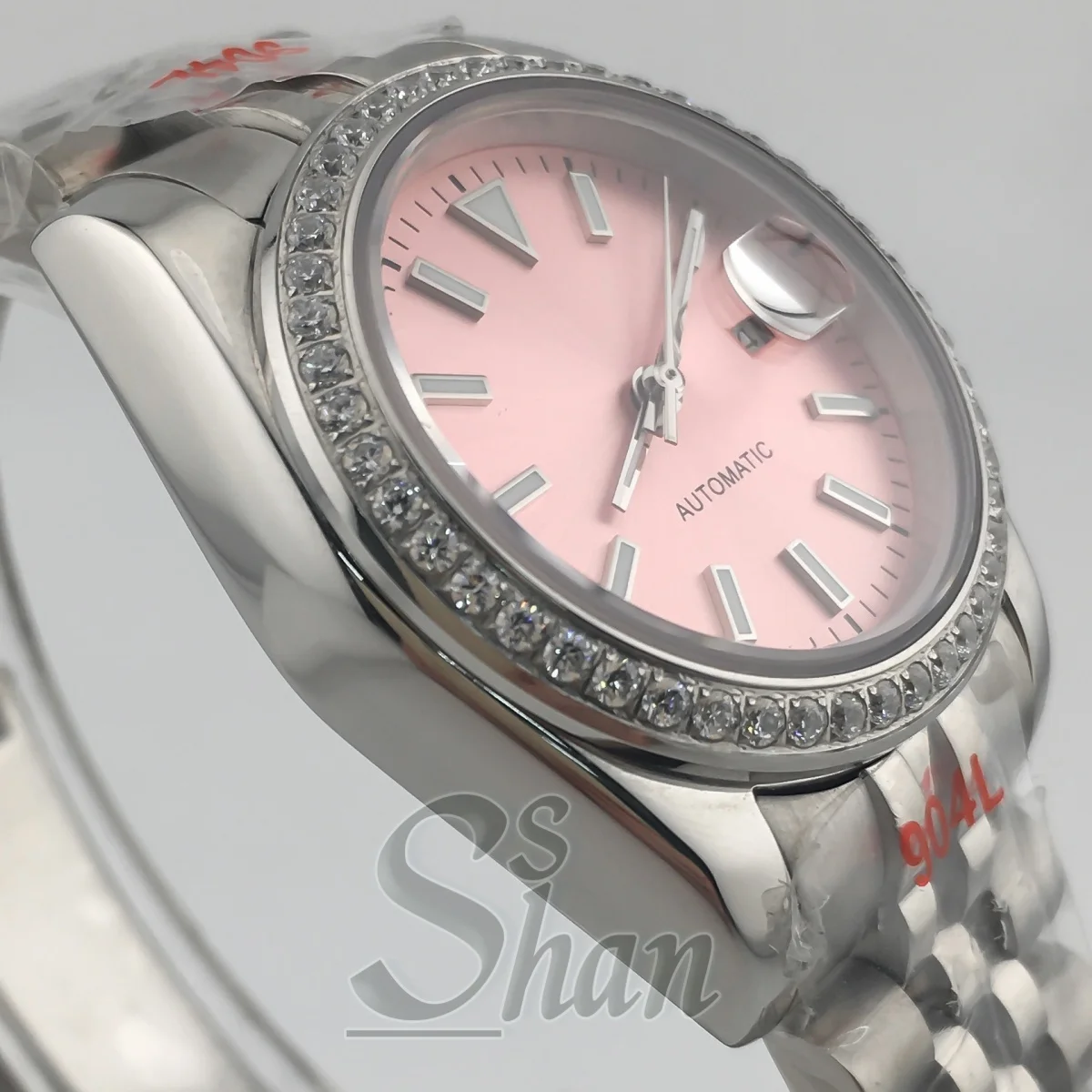 Zegarek damski NH05 31mm, luksusowy, automatyczny, szafirowe szkło, diamentowa luneta, luminescencyjna różowa tarcza, wodoszczelność do 100 metrów.