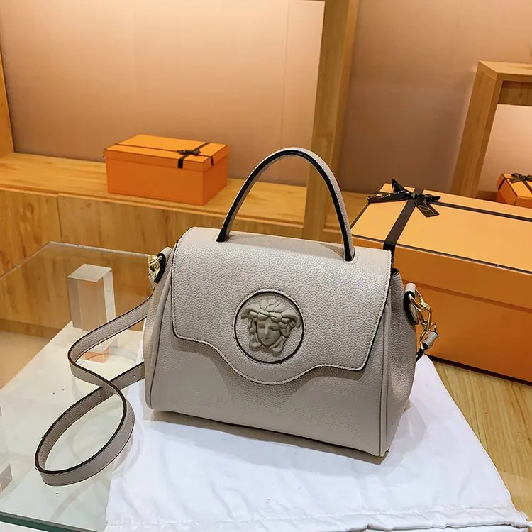 

2025 Новинка! Женская модная однотонная сумка | Откидной дизайн, нишевая текстура | Модный стиль через плечо