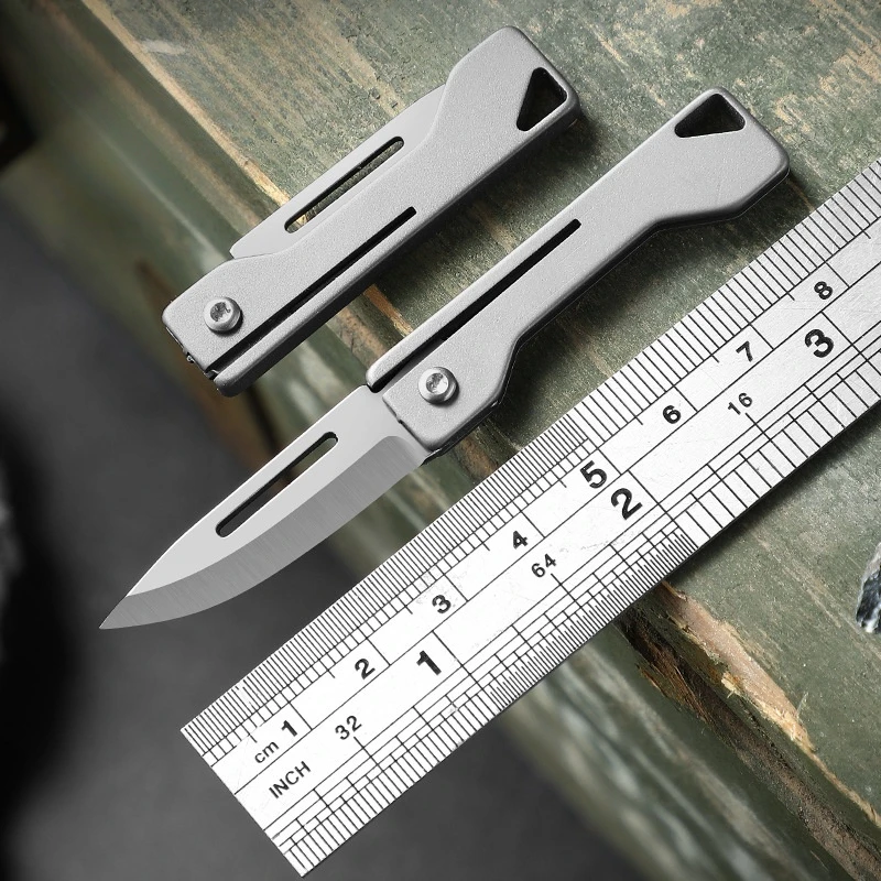 

EDC Titanium Alloy Folding Knife Mini Keychain Portable Pocket Knife Unboxing Unpacking Tool Fruit Knife Cuchillo de bolsillo