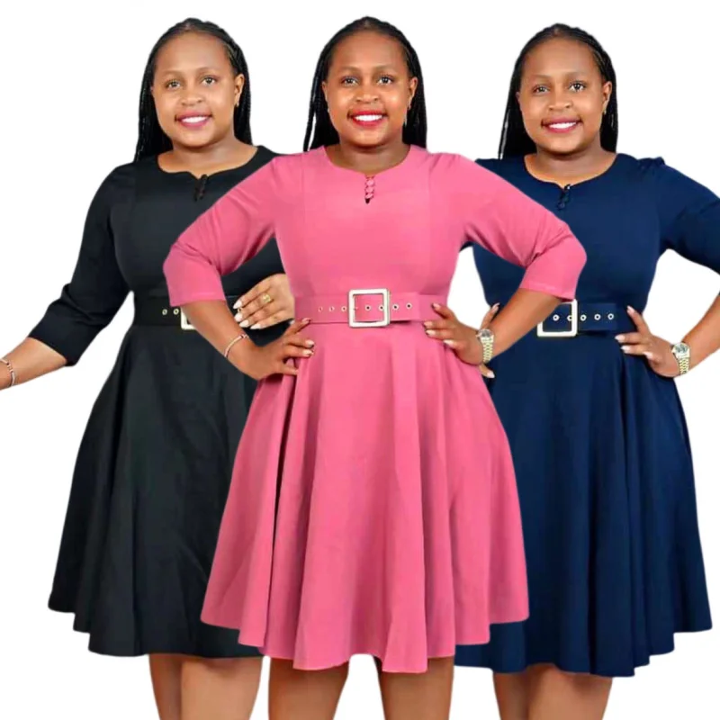 มืออาชีพของผู้หญิงสวมชุดปุ่มสีทึบปลอมแอฟริกันสําหรับผู้หญิง