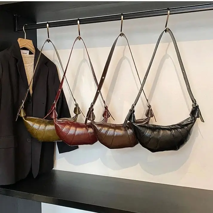 Retro horn bag women's 2025 new autumn and winter tide fashion Korean shoulder dumpling bag versatile messenger bag dumpling bag
