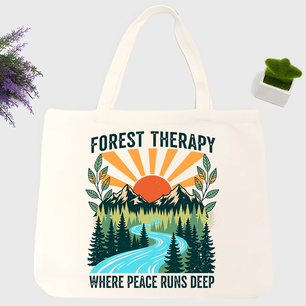 Men's nature graphic canvas tote bag with retro forest print, perfect for outdoor outings and casual daily use
