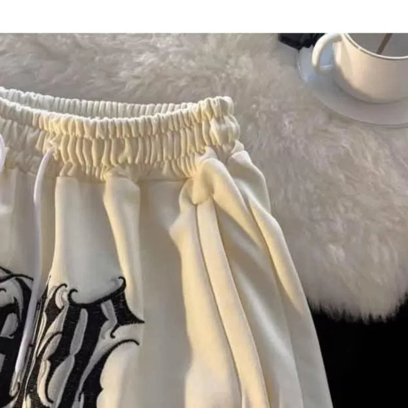 Summer 2024 Men\'s New Patchwork Elasticized High-waisted Embroidery Drawstring Pocket Fashion Solid Color Casual Sports Shorts