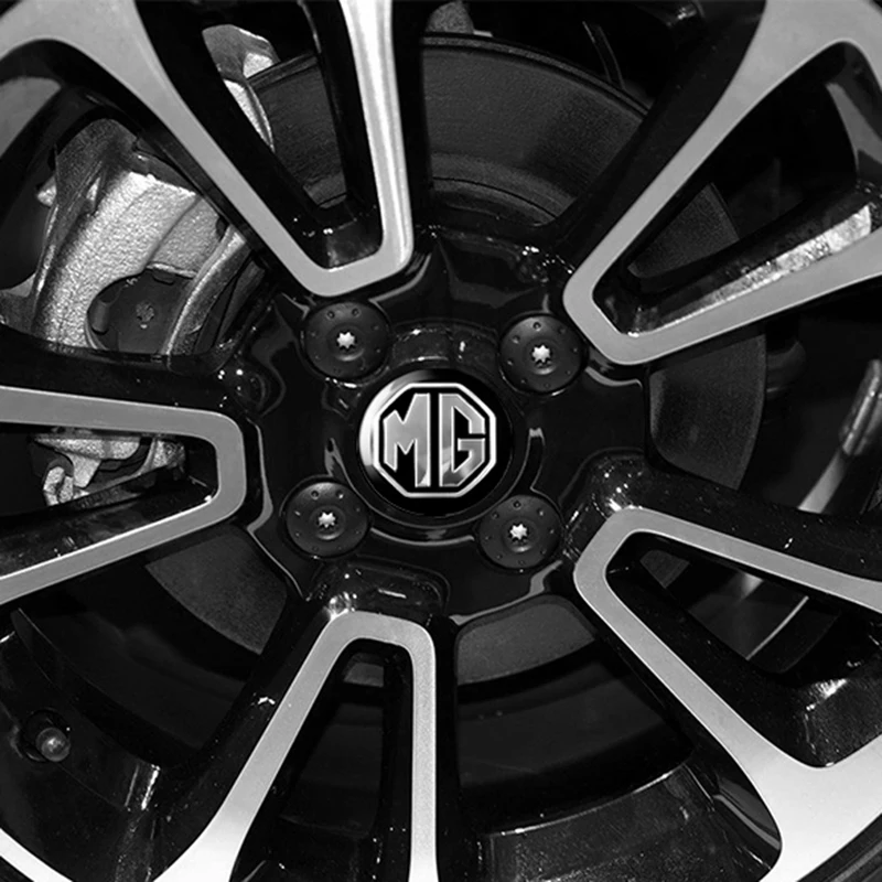 4 قطعة عجلة السيارة مركز محور قبعات شارة ملصق ديكور الشارات لموريس المرآب MG ZS 7 6 Cyberster MG4 EV ES5 HS واحد GT GS MG3 MG6
