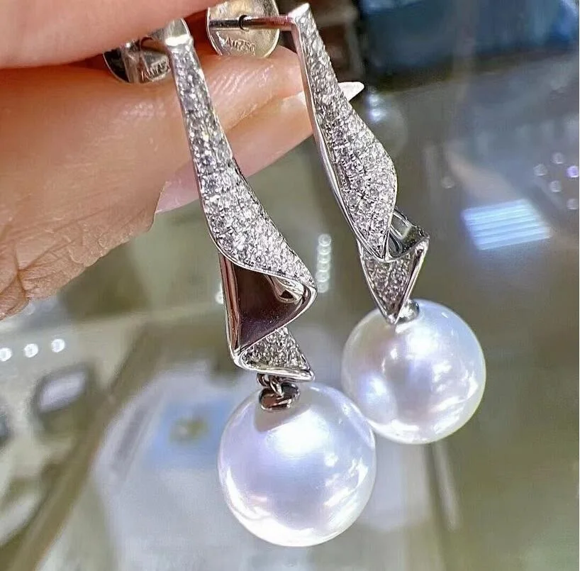 

Gorgeous and huge AAAAA 10-11mm circular natural South China Sea white pearl earrings 925S