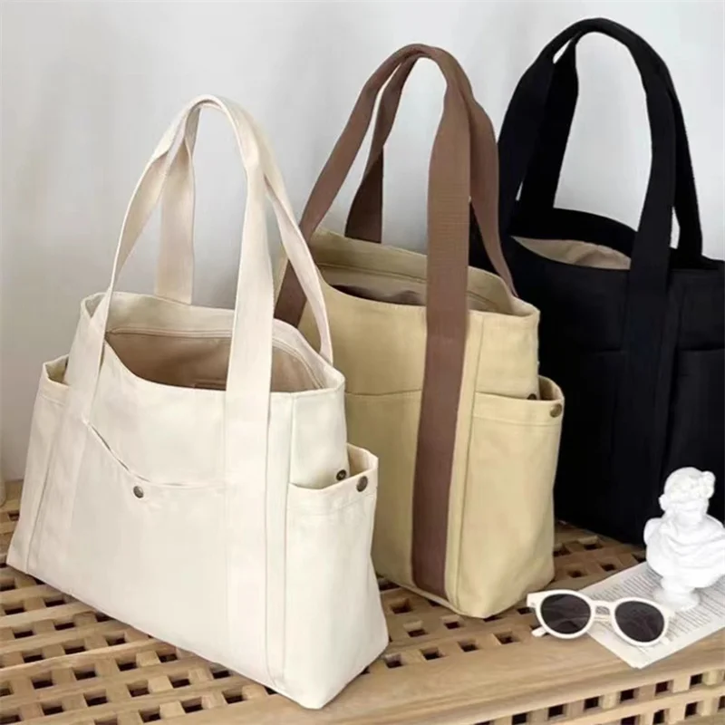 Borsa Tote di grande capacità borsa a tracolla in tela per pendolarismo borsa alla moda e conveniente per le donne Versatile pendolarismo 2024 nuovo