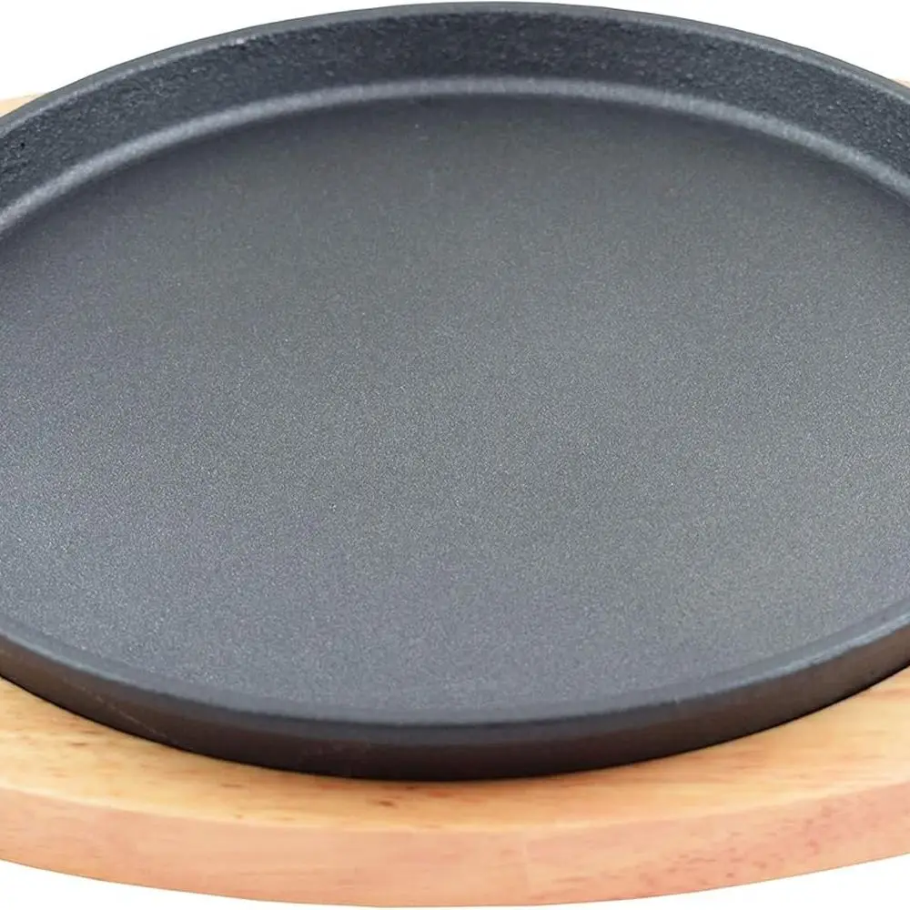 

Eleven Inch Round Cast Iron Pizza Pan with Rubberwood Underlay for Baking and Grilling