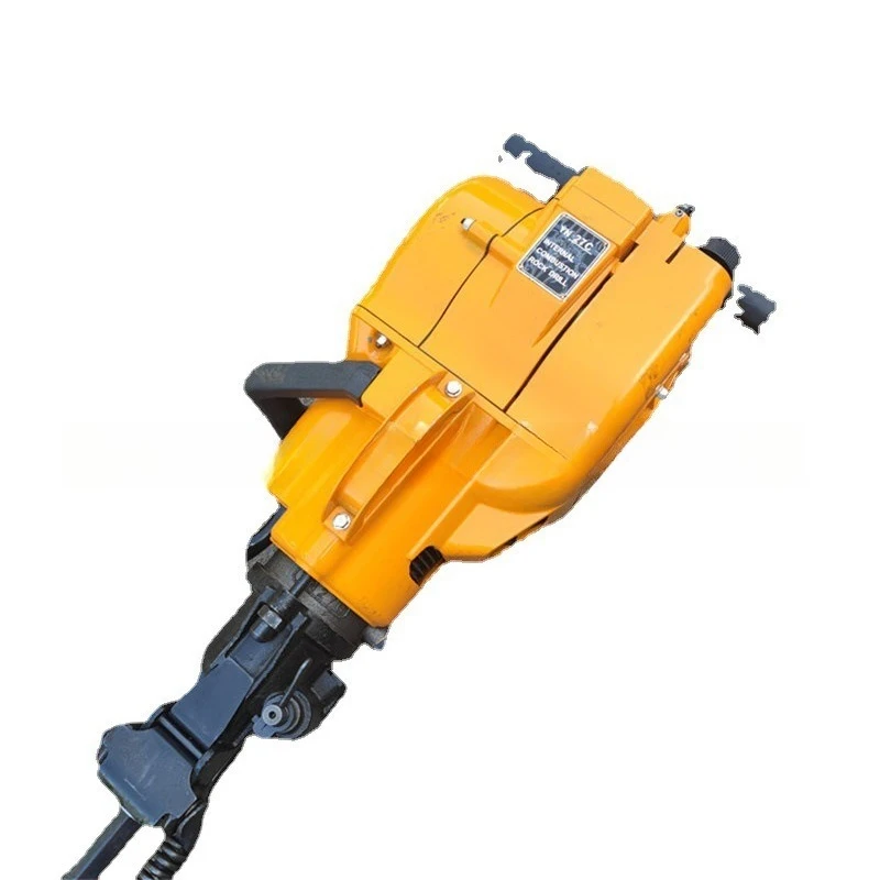 

Internal combustion rock drill, fast breaking and drilling, one person handheld, engine driven