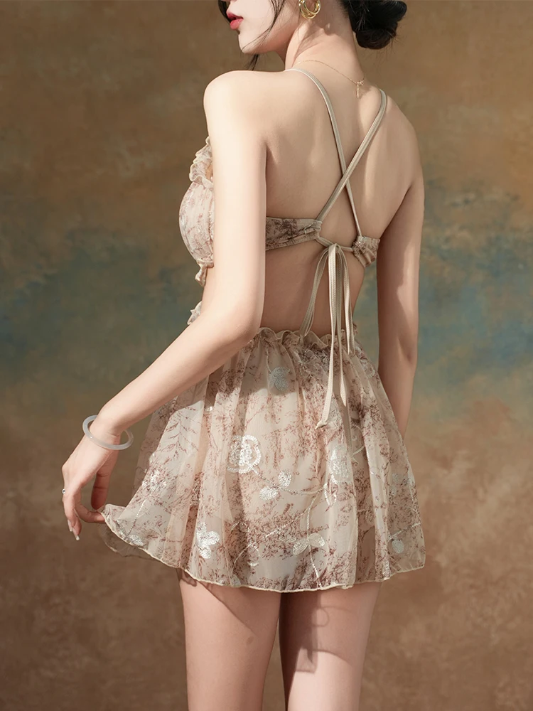 Traje de baño para mujer verano 2025 nueva Hada de una pieza traje de baño de encaje conservador estampado volantes hueco Sexy sin espalda trajes de baño de vacaciones
