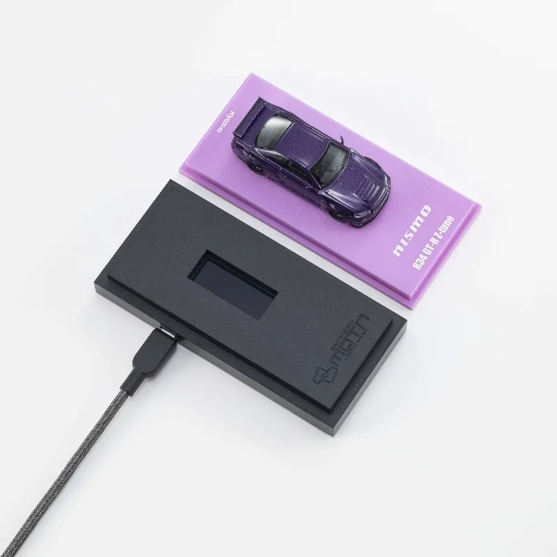 

Kyosho 1:64 Nissan NISMO R34 GTR Z-tune 2025 Beijing Exhibition car model, Boys' festival gift toy, adult collection ornament.