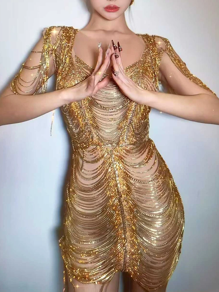 Wysokiej jakości łańcuszek z kryształkami seksowna prześwitująca sukienka z siateczki 2025 nowych moda niestandardowa odzież damska
