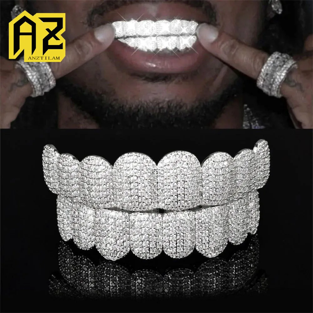 

Anztilam Bling Iced Out Grillz Полный циркон Зубы Блеск Грили Мужчины Женщины Хип-Хоп Зубные Грили Кепки Латунные Модные Ювелирные Изделия