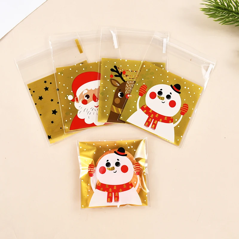 100pcs Christmas Party Plastic Candy Bags Santa/Snowman/Deer Cookie Bag For Neol DIY Biscuits Snack Baking Packaging Supplies