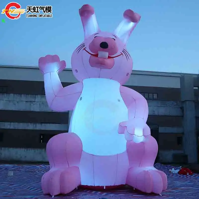 กระต่ายเป่าลมอวยพรเทศกาลอีสเตอร์ถือไข่สำหรับโฆษณา โมเดลกระต่ายเป่าลมขนาดใหญ่สำหรับตกแต่งสนาม