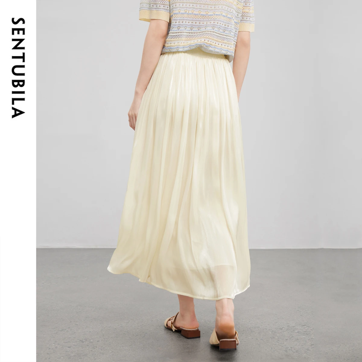 SENTUBILA النساء المشمش التنانير الطويلة 2025 السببية الرباط الخصر سوينغ هيم أنيقة ألف خط طيات التنانير ملابس الصيف W52QA1636