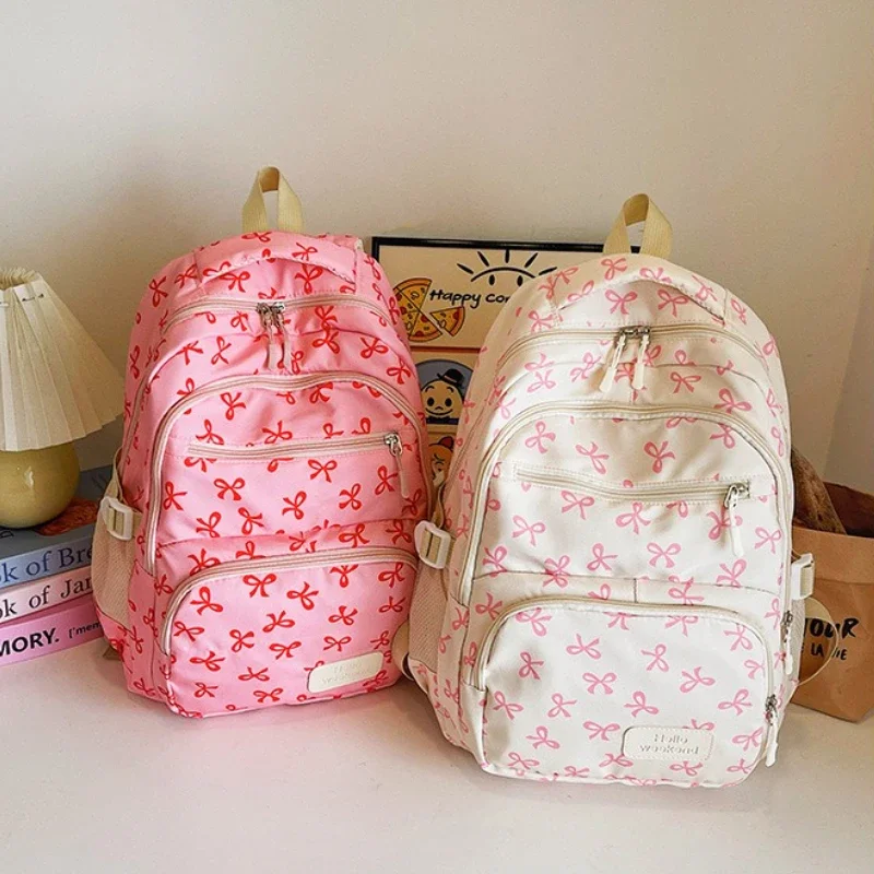 طقم نسائي جديد مكون من 3 قطع لعام 2025، طراز كوري، حقيبة ظهر عصرية للسفر بطباعة فيونكة، حقيبة مدرسية خفيفة الوزن وبسيطة للطلاب #4