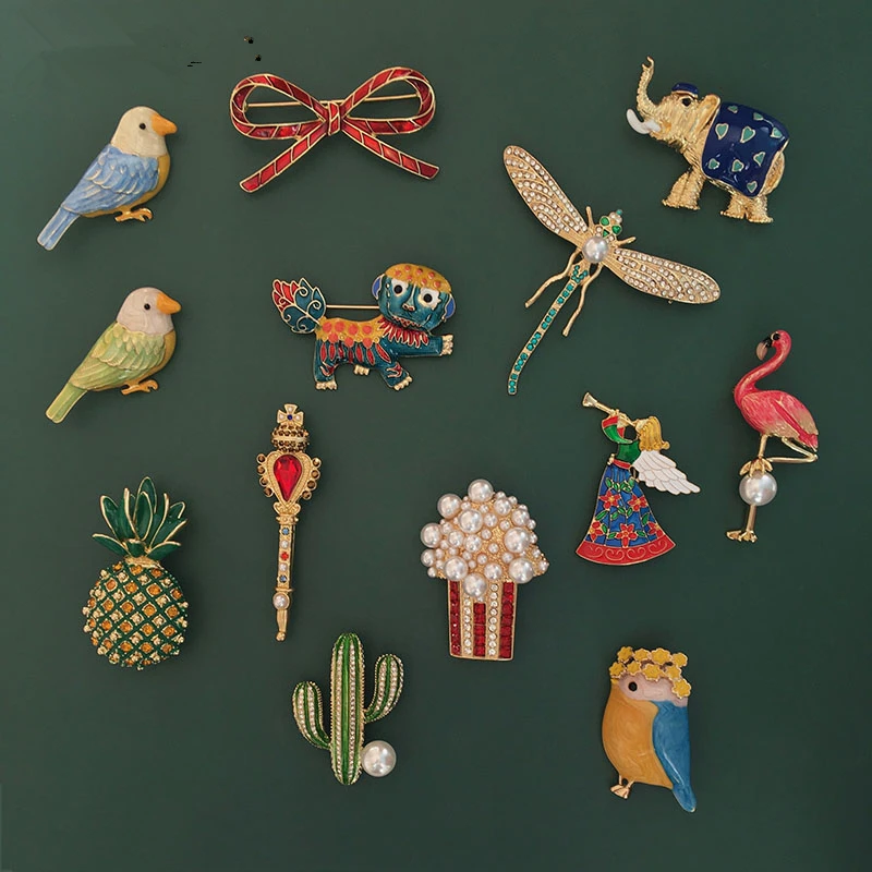 HUANZHI Vintage Gold Color Enamel Pearls Crystal Pin Bird Rabbit Flower Elephant Scepter Bow Pineapple Popcorn Brooch for Women