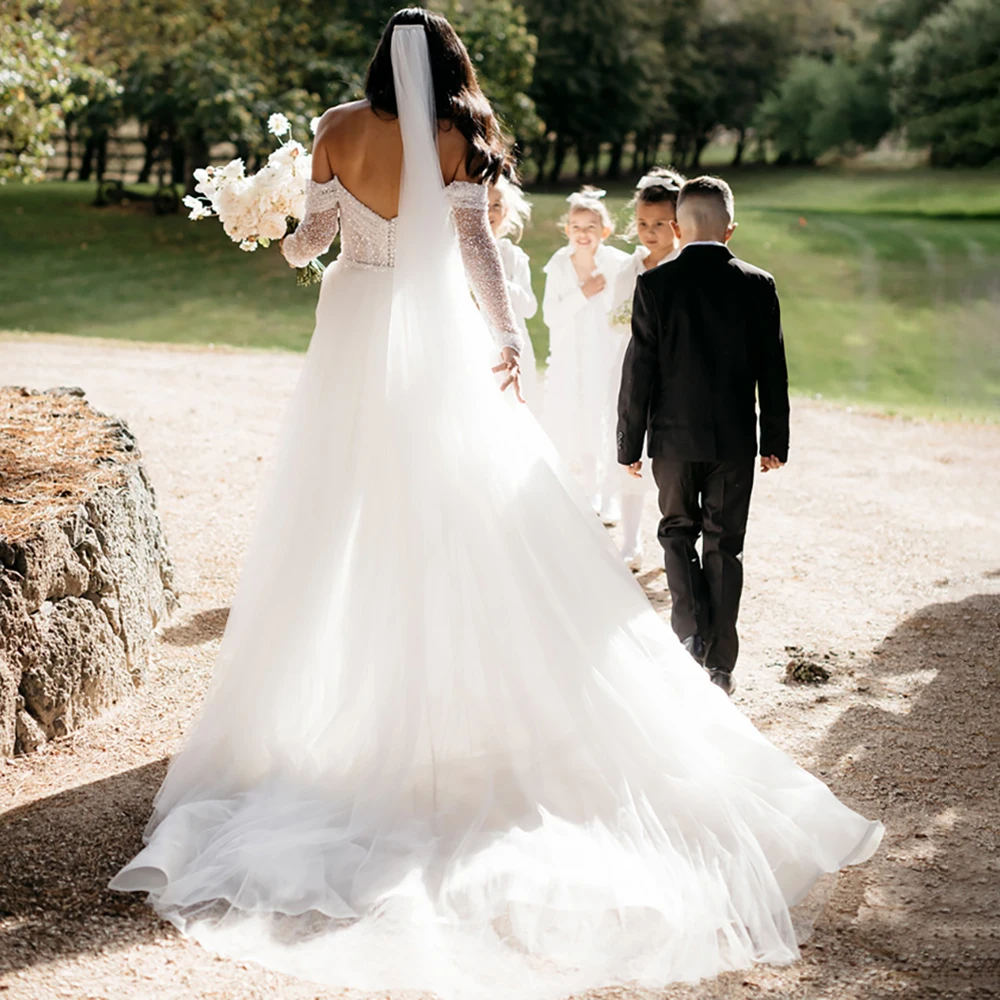 Shiny Pailletten Off Schulter Meerjungfrau Hochzeit Kleid Nach Maß Abnehmbaren Tüll Zug Langen Ärmeln Glitter Gugel Neck Brautkleid