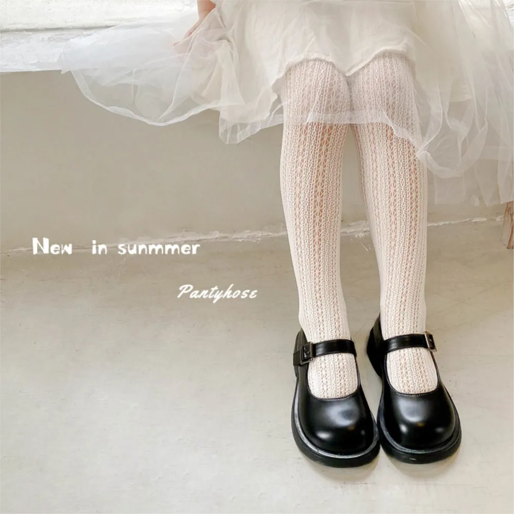 

Girls' pantyhose wholesale vertical daisy leggings mesh openwork thin baby leggings pants.