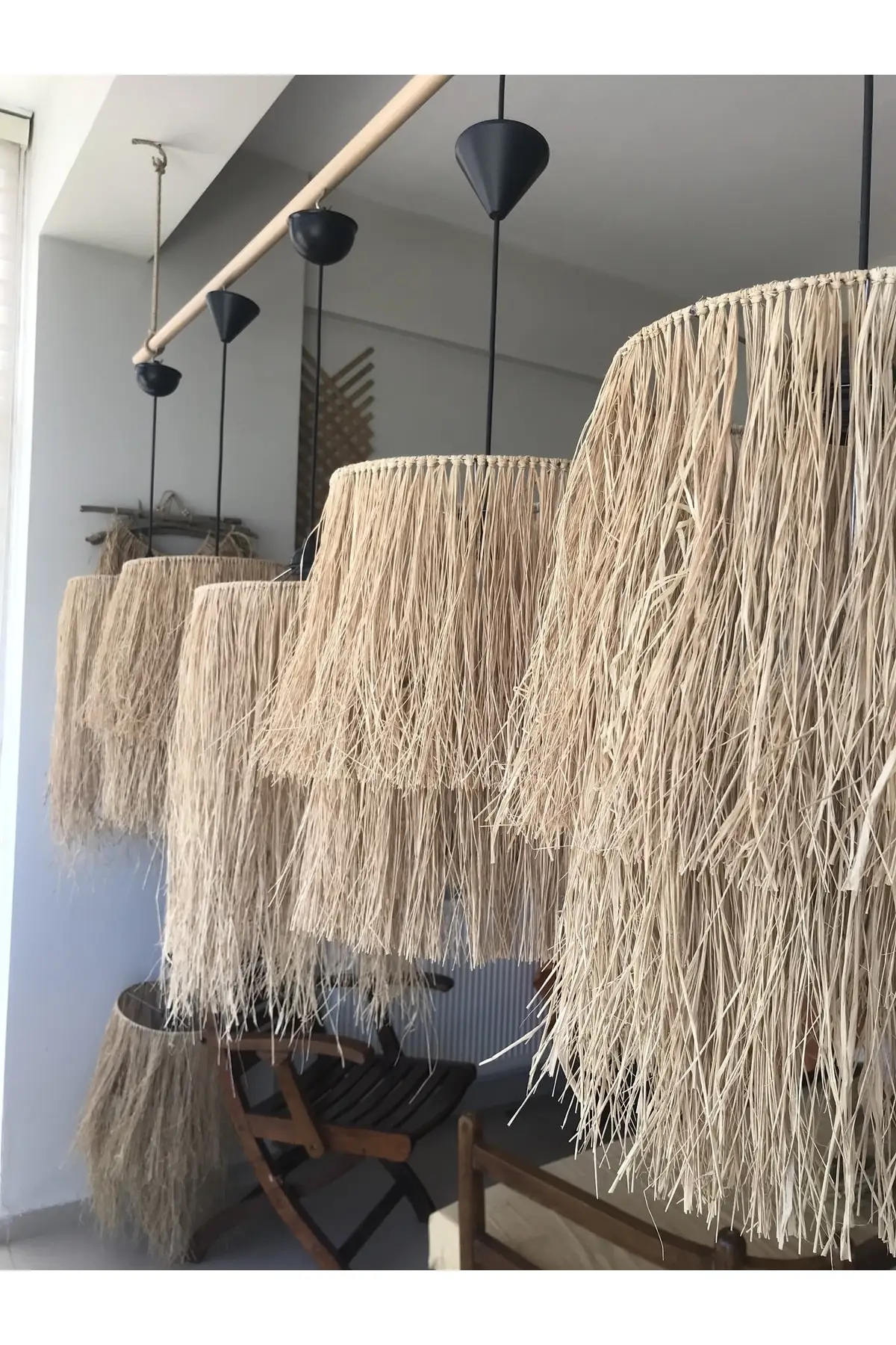 

DOLBOVI bohemian fringed raffia chandelier